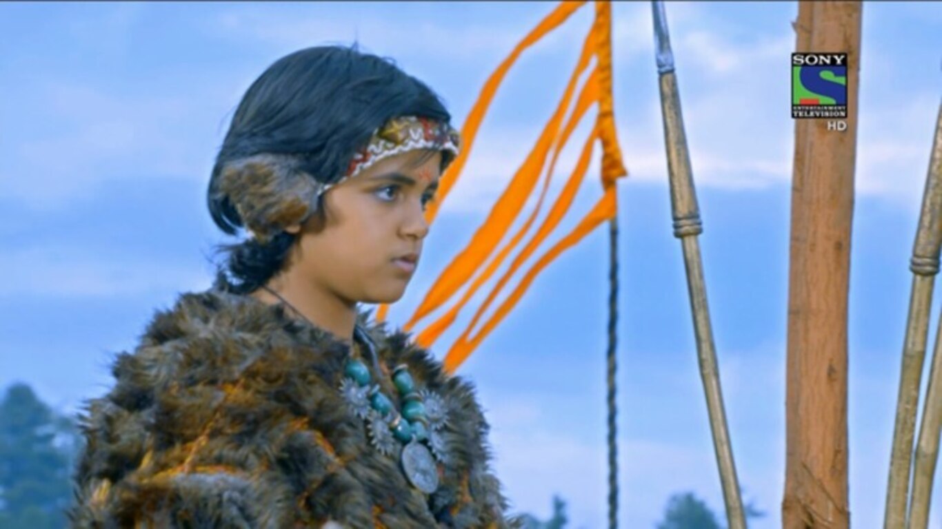 Karn Picks Up The Bow