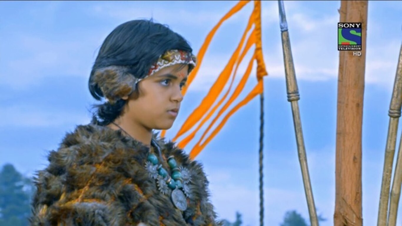 Karn Picks Up The Bow