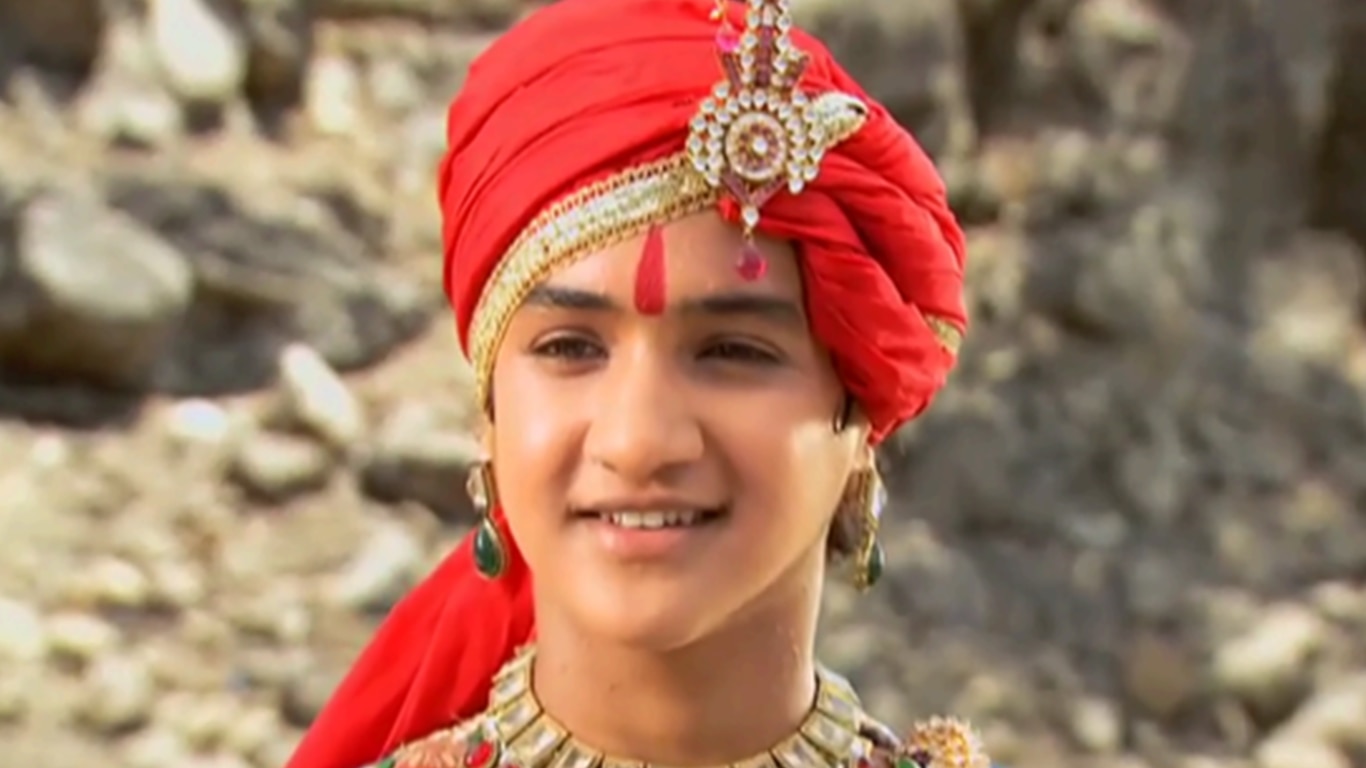 Pratap is mesmerized by the Family Sword